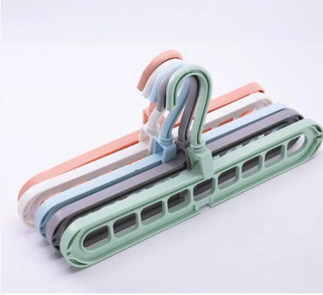 Cintre organisateur gain de place — Rangement multi-fentes pour placard